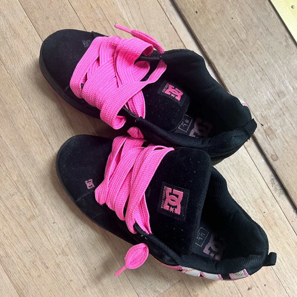 Pink and black DC shoes